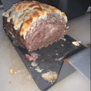 Chicken Cordon Bleu Meatloaf served with creamy mushroom sauce