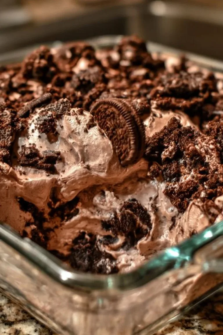 Delicious Oreo Dirt Cake with crushed Oreos and creamy layers